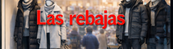 Витрина магазина в Испании с яркой надписью «Las rebajas» и зимними скидками до 50 %
